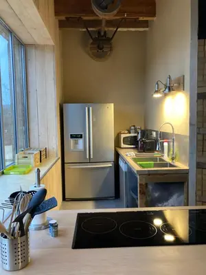 Cuisine ou kitchenette dans l'établissement Gîte L'Atelier de Tournerie