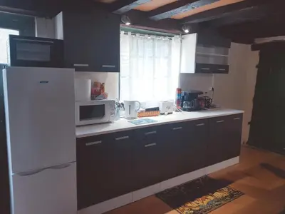 Cuisine ou kitchenette dans l'établissement Gite l'Escale