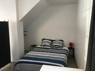 Un ou plusieurs lits dans un hébergement de l'établissement Appartement centre ville