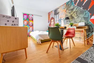 Un ou plusieurs lits dans un hébergement de l'établissement Le Pop Art - Topbnb Dijon