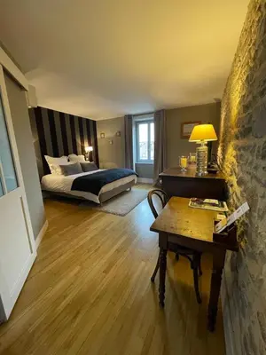 Un ou plusieurs lits dans un hébergement de l'établissement MA CHAMBRE A SAINT AMOUR