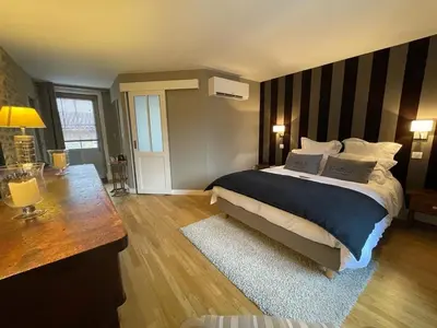 Un ou plusieurs lits dans un hébergement de l'établissement MA CHAMBRE A SAINT AMOUR