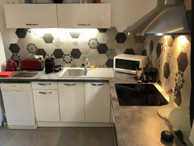 Cuisine ou kitchenette dans l'établissement Suite Darcy & Spa