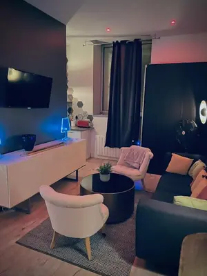 Coin salon dans l'établissement Suite Darcy & Spa