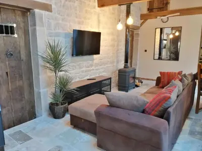 Télévision ou salle de divertissement dans l'établissement Gîte Les Hauts de Morey - Aux Bonnes-Mares