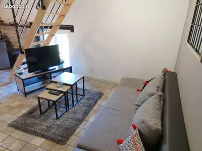 Coin salon dans l'établissement Charmant appartement dans maison de village