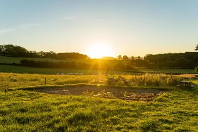 Lever ou coucher de soleil vu de la maison de vacances ou à proximité