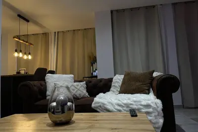 Coin salon dans l'établissement Appart&Spa Devosge