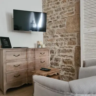 Télévision ou salle de divertissement dans l'établissement La Dolce Vita Spa privatif