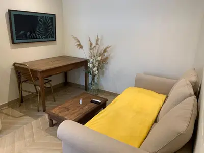 Coin salon dans l'établissement Chez Marie - Centre - Parking privé - Hospices