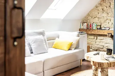 Coin salon dans l'établissement SOUS LE HAUT DES REMPARTS