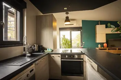 Cuisine ou kitchenette dans l'établissement LE COTTAGE Zen LOVE