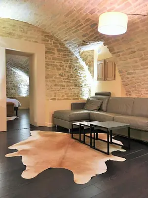 Coin salon dans l'établissement Appartement La Borde