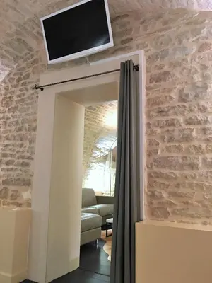 Télévision ou salle de divertissement dans l'établissement Appartement La Borde