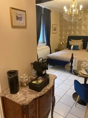 Un ou plusieurs lits dans un hébergement de l'établissement LE TOUT JOLI NID BEAUNOIS, Studio Plein centre parking