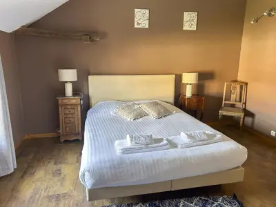 Un ou plusieurs lits dans un hébergement de l'établissement Maison Belles Pierres