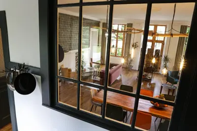 Coin salon dans l'établissement Arc en Sel Maison d’hôtes