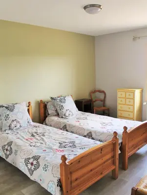 Un ou plusieurs lits dans un hébergement de l'établissement Domaine Joseph LAFARGE Wine Resort WineMaker House La maison du Négociant