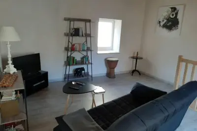 Coin salon dans l'établissement Petit gîte rural - la Forge -