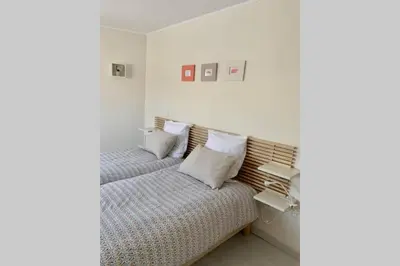 Un ou plusieurs lits dans un hébergement de l'établissement Appt 1 à 4 pers Cocoon,1,500 km sortie auto, 3 km Ctre Mâcon, PKG cour privée