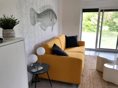 Coin salon dans l'établissement Les 4 gites de la Saisse