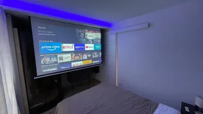 Télévision ou salle de divertissement dans l'établissement Bienvenue chez vous 