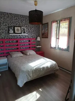 Un ou plusieurs lits dans un hébergement de l'établissement chalet deux chambres au calme
