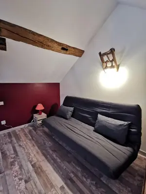 Coin salon dans l'établissement Gites les écuries Saserang