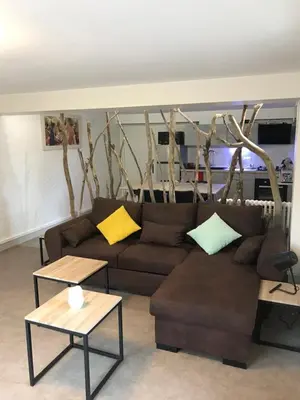 Coin salon dans l'établissement Les gîtes de Belle Roche