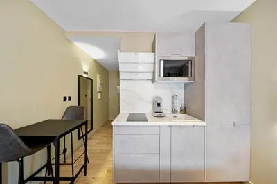Cuisine ou kitchenette dans l'établissement Le Darcy - Standing - Centre-ville