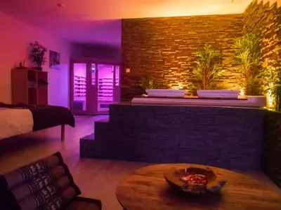 Coin salon dans l'établissement Appart' spa privatif Gray