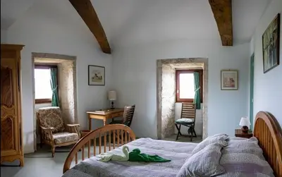 Un ou plusieurs lits dans un hébergement de l'établissement La Maison Royale