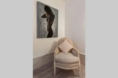 Coin salon dans l'établissement Chez la Tante Louise - appartement privé de charme