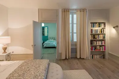 Un ou plusieurs lits dans un hébergement de l'établissement Chez la Tante Louise - appartement privé de charme