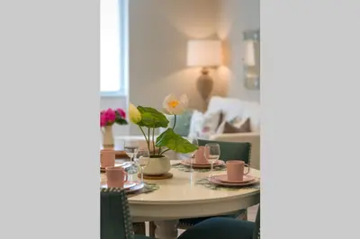 Coin salon dans l'établissement Chez la Tante Louise - appartement privé de charme