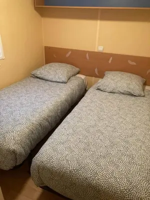 Un ou plusieurs lits dans un hébergement de l'établissement Mobil-Home 2 
