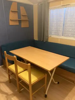 Coin salon dans l'établissement Mobil-Home 2 