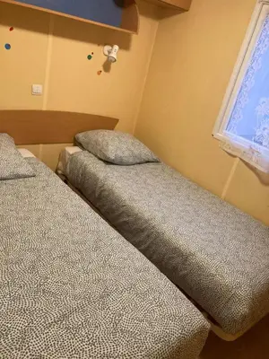 Un ou plusieurs lits dans un hébergement de l'établissement Mobil-Home 2 