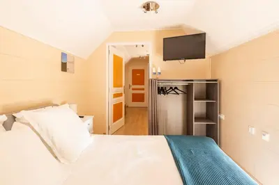 Un ou plusieurs lits dans un hébergement de l'établissement Les Grands Crus - Gîte 