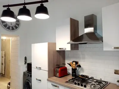 Cuisine ou kitchenette dans l'établissement Le petit Saint Bernard