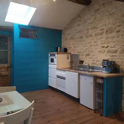Cuisine ou kitchenette dans l'établissement La Mezzabulle