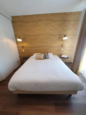 Un ou plusieurs lits dans un hébergement de l'établissement Legend Majestic - 3 chambres - Parking privé GRATUIT - Centre Ville - Quai de Saône - Gare - fibre