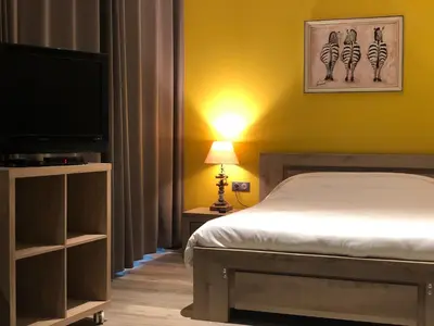 Un ou plusieurs lits dans un hébergement de l'établissement Hotel de l'Abbaye à Cluny