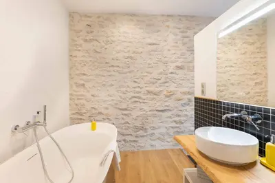 Salle de bains dans l'établissement Chez Romain