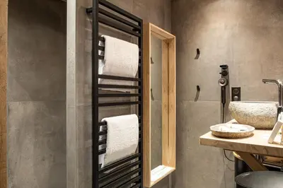 Un ou plusieurs lits dans un hébergement de l'établissement Le Studio des Prés Verts Suite Design avec Jacuzzi Privatif