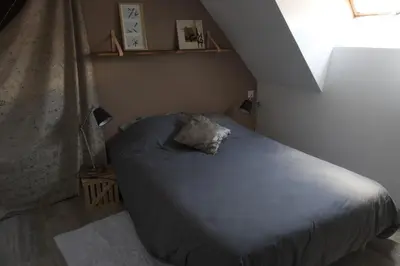 Un ou plusieurs lits dans un hébergement de l'établissement Duplex charmant idéalement situé