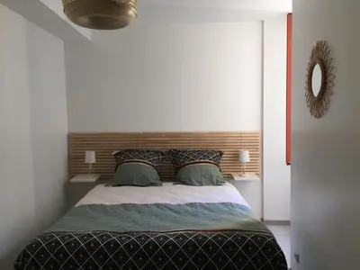 Un ou plusieurs lits dans un hébergement de l'établissement Montbard appartements au centre historique chez Delphine et Guillaume