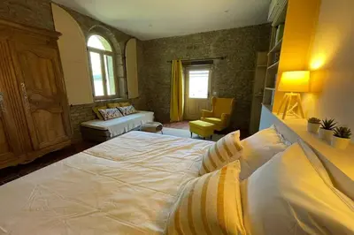 Un ou plusieurs lits dans un hébergement de l'établissement Gîte de la Fontaine salée