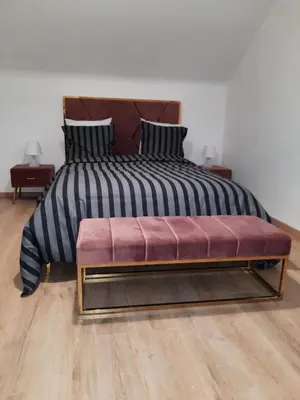 Un ou plusieurs lits dans un hébergement de l'établissement Luxury suites maladiere 1