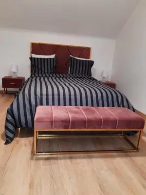 Un ou plusieurs lits dans un hébergement de l'établissement Luxury suite maladiere 2